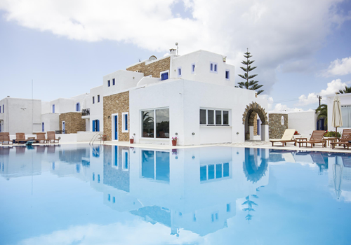 Exterior and pool view at Naxos Holidays in Naxos