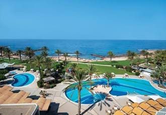 Pool area and beachfront at the Constantinou Bros Athena Beach Hotel, Cyprus.