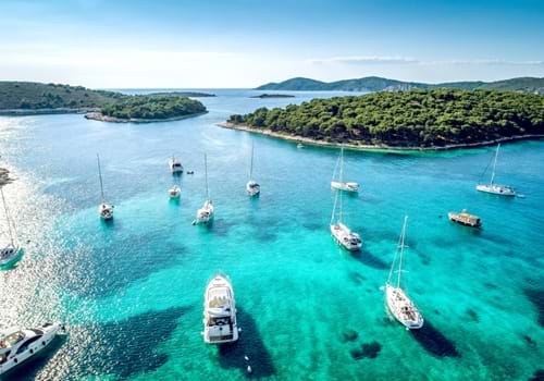 Aerial View Of Paklinski Islands In Hvar, Croatia. Turquise Water Bays With Luxury Yachts And Sailing Boats