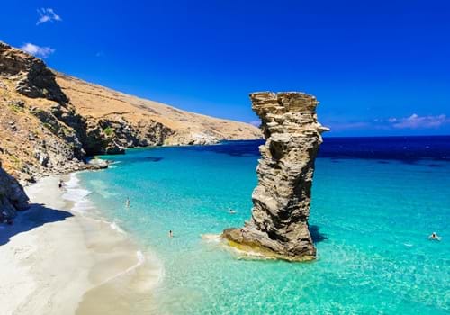 shutterstock_554001355_Turquoise beautiful beaches of Greece - Andros island, Tis Grias To Pidima beach_GREECE.jpg